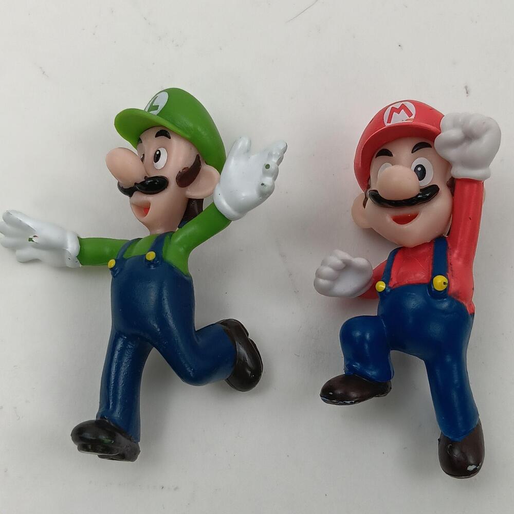 Nintendo Super Mario Bros Mario Luigi jumping Figures Lot Of 2